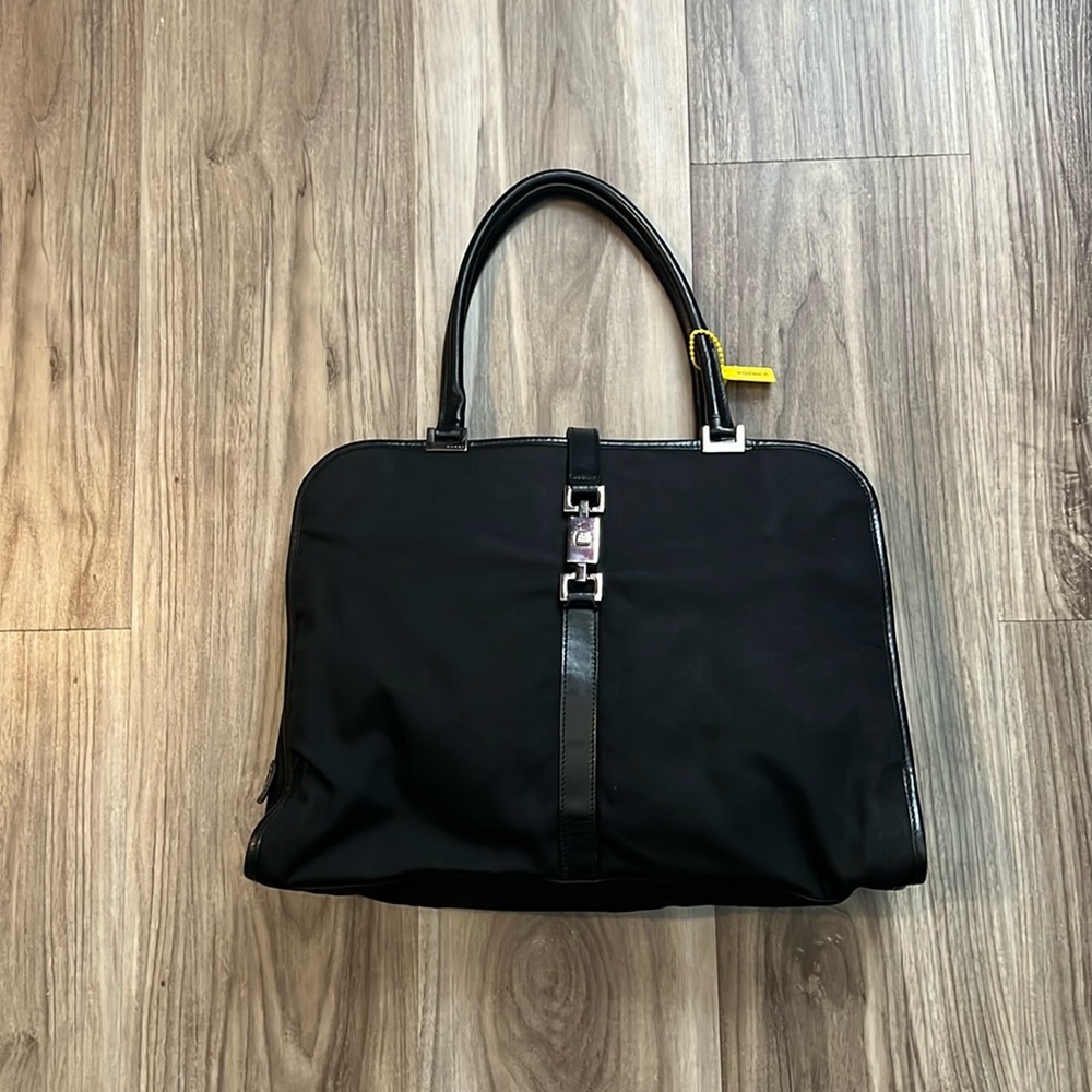 Gucci Jackie piston lock black bag with silver hardware, leather handles & trim